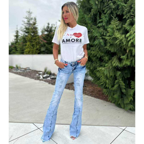 Dámska móda, doplnky - Dámske zvonové jeans s trhaním