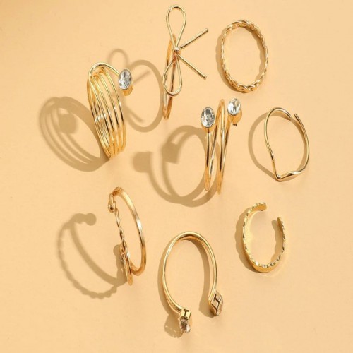 Dámska móda, doplnky - Súprava prstienkov 8 kusov - zlatá - Golden bow